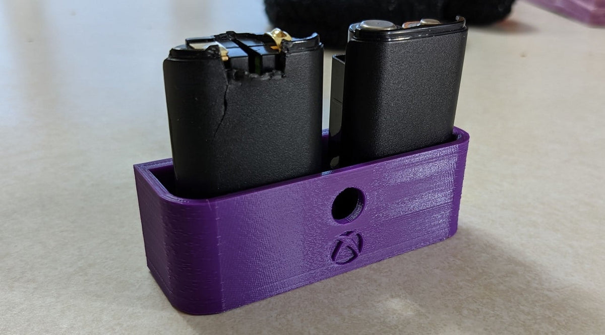 Support mural pour batterie Xbox 360 – setup gaming bien rangé
