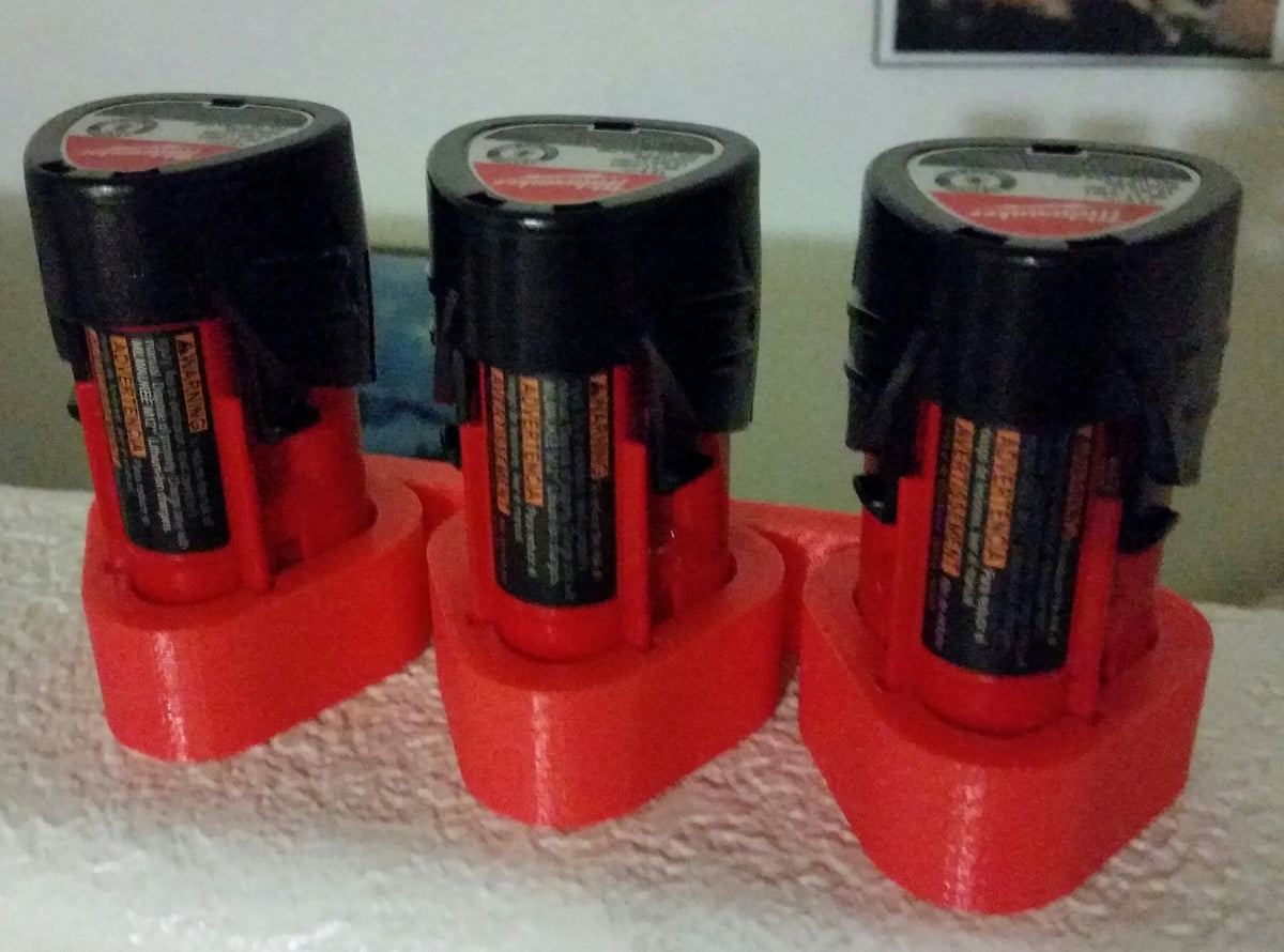 Support mural pour trois batteries Milwaukee M12