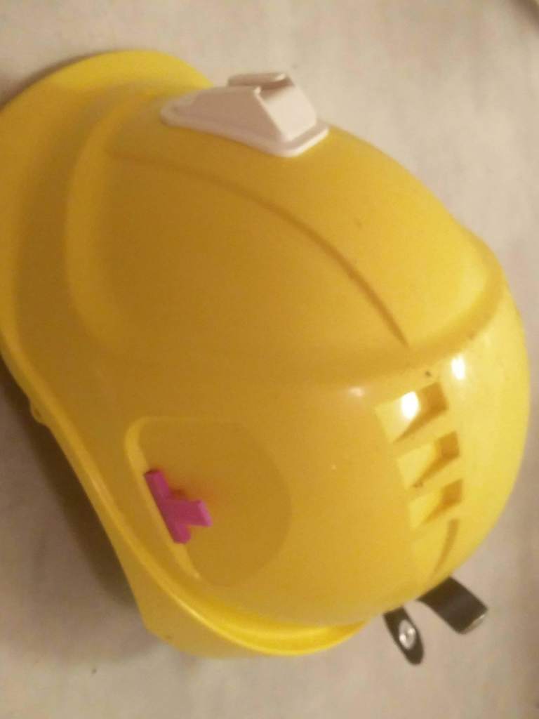 Attache-câble pour la lampe frontale d'un casque de mineur
