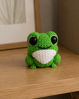 Figurine grenouille – une décoration amusante pour l'étagère