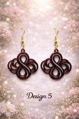 Boucle d'oreille cœur à motif spirale style Art déco, vue de côté