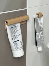 TubeHolder mural pour salle de bain – organiseur pour dentifrice et crèmes