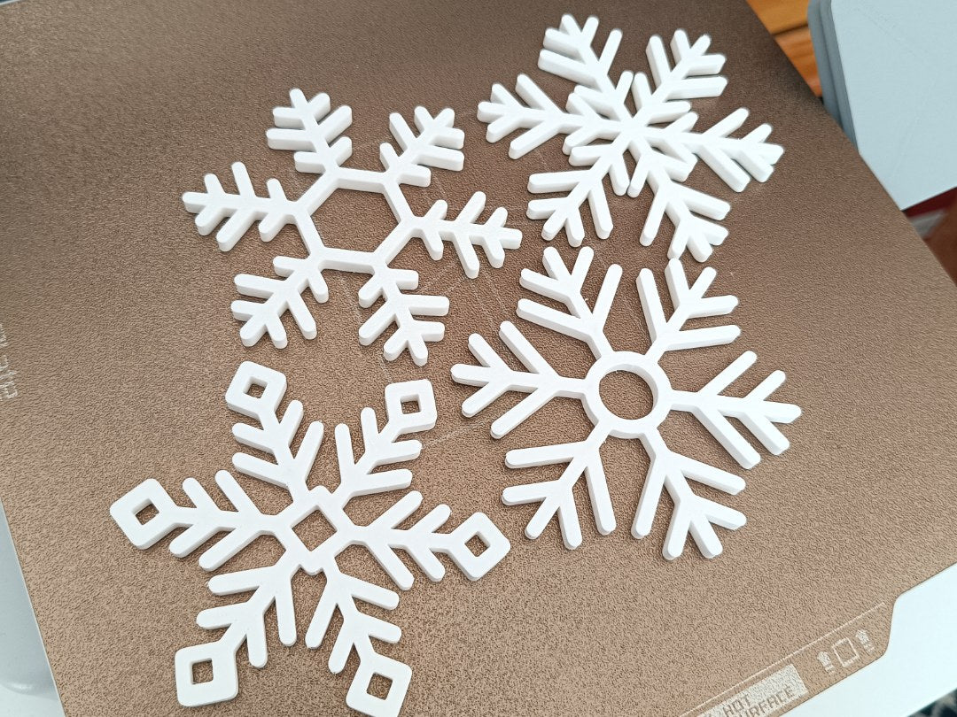 Lot de 4 sous-verres en forme de flocon de neige