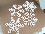 Lot de 4 sous-verres en forme de flocon de neige