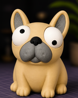 Gros plan de Goofy Frenchie – figurine de bouledogue français aux grands yeux mobiles