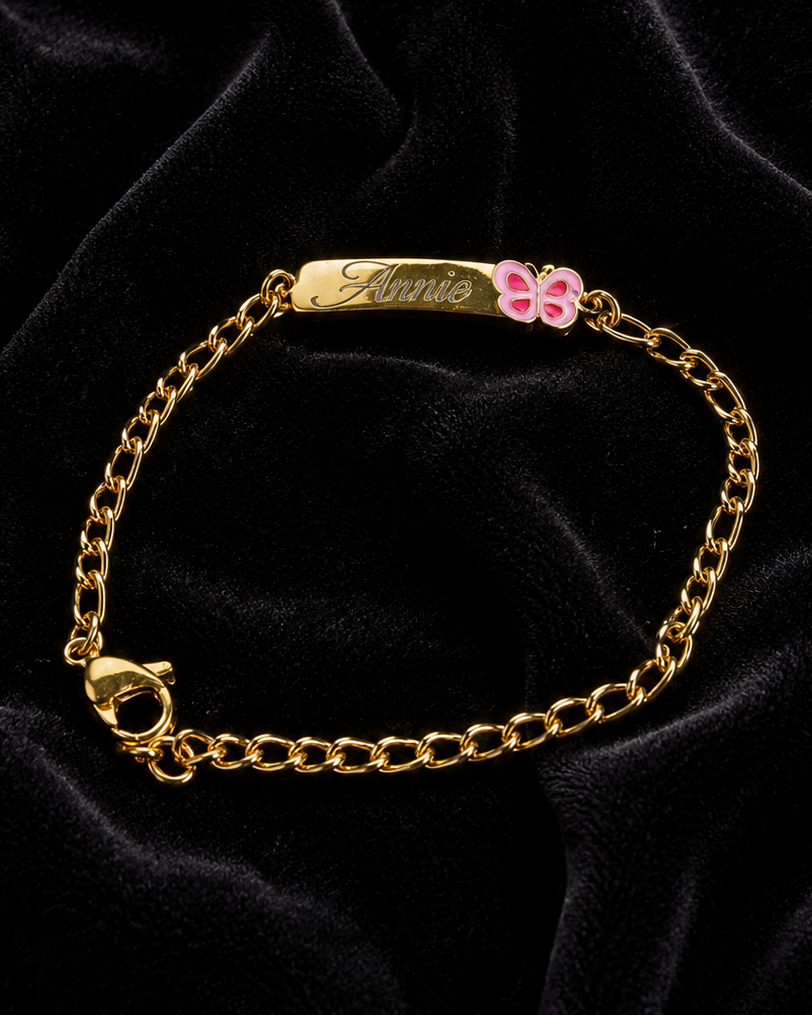 Bracelet enfant en acier doré gravé avec papillon rose