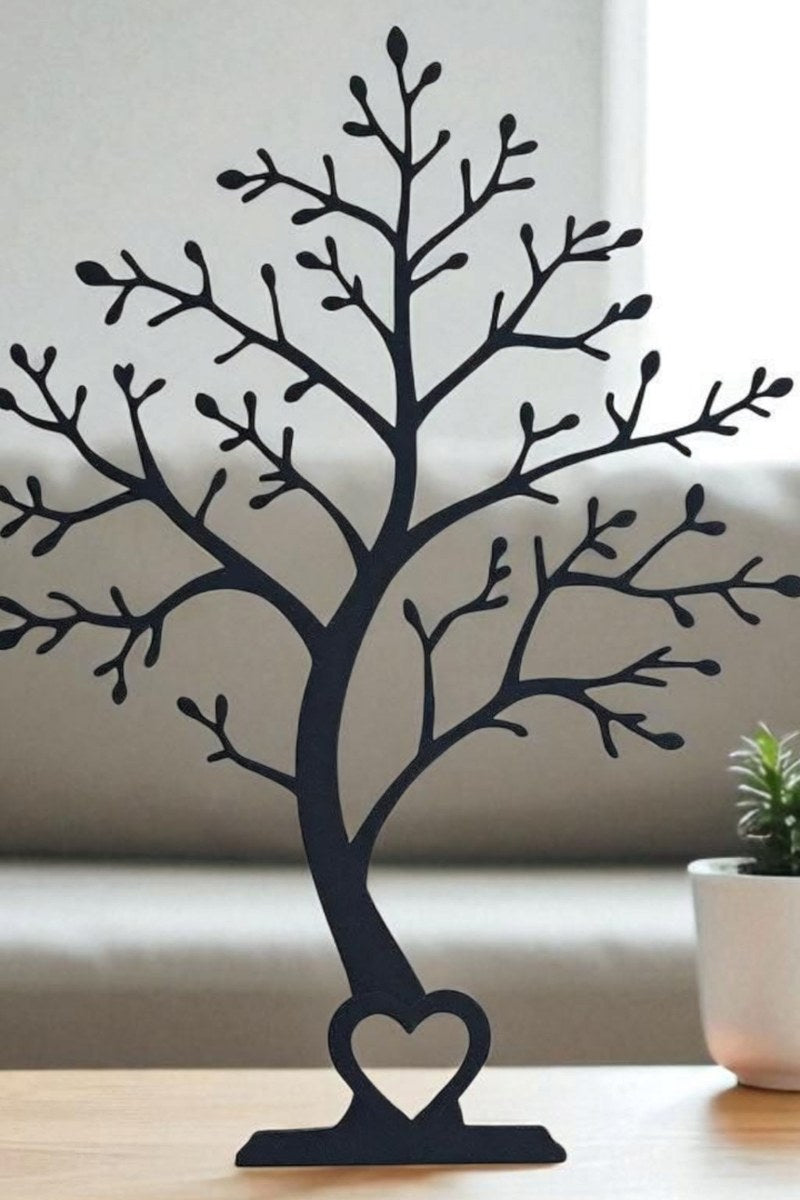 Arbre décoratif minimaliste en silhouette, vu de face, aux lignes de branches épurées