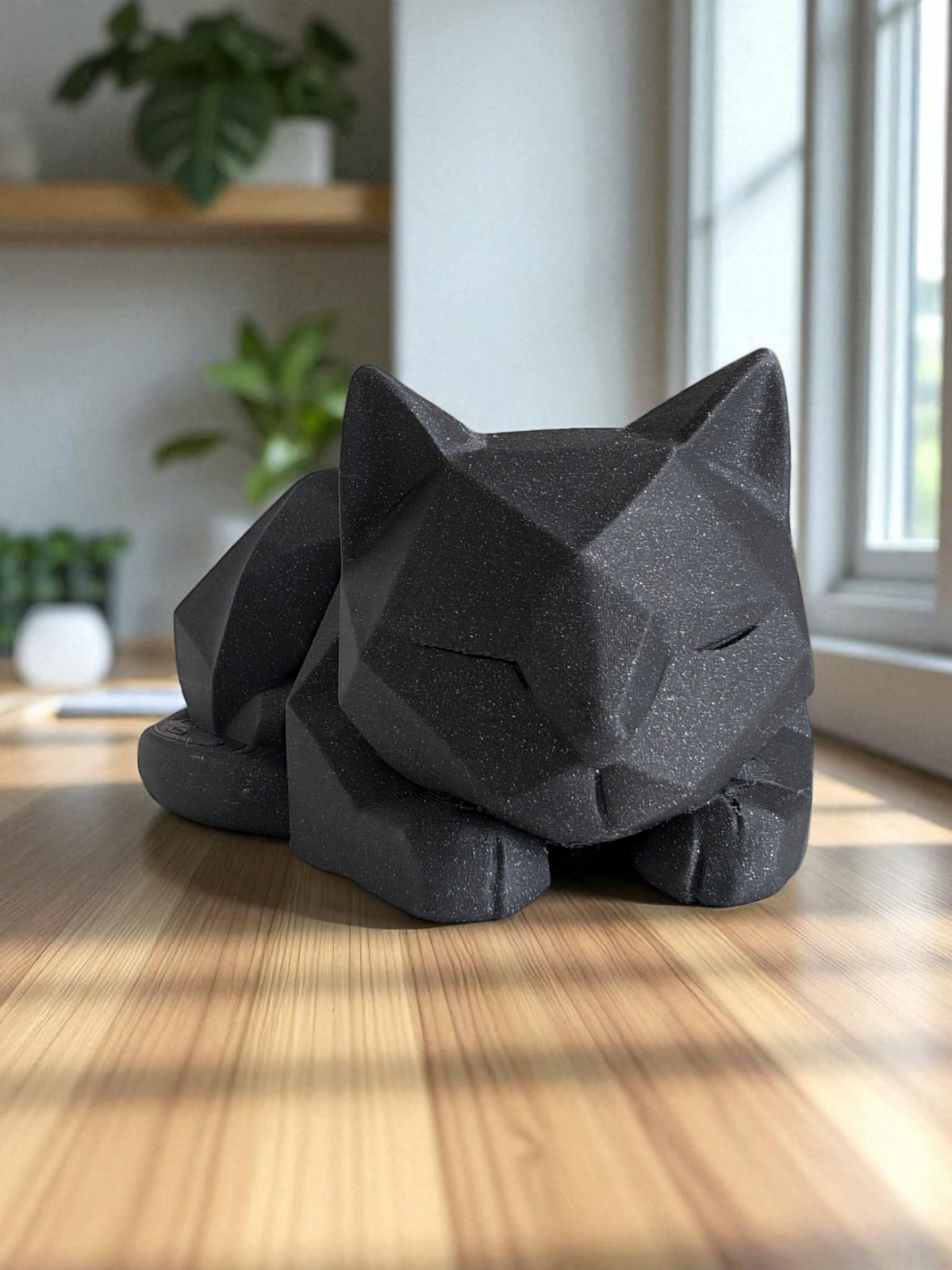 Gros plan d'une figurine de chat low poly aux surfaces géométriques