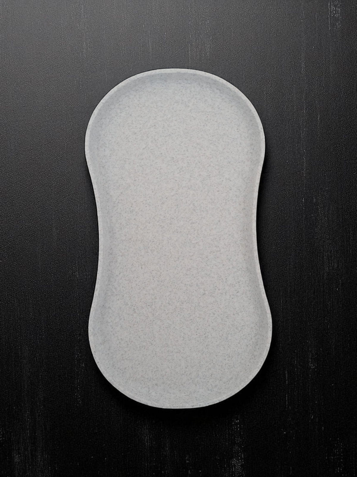 Repose-cuillère blanc minimaliste avec plateau bas, gros plan