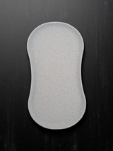 Repose-cuillère blanc minimaliste avec plateau bas, gros plan