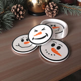 Gros plan d'un support texturé boule de neige avec sous-verres bonhomme de neige