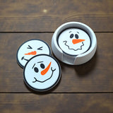 Six sous-verres bonshommes de neige aux visages différents dans leur support assorti