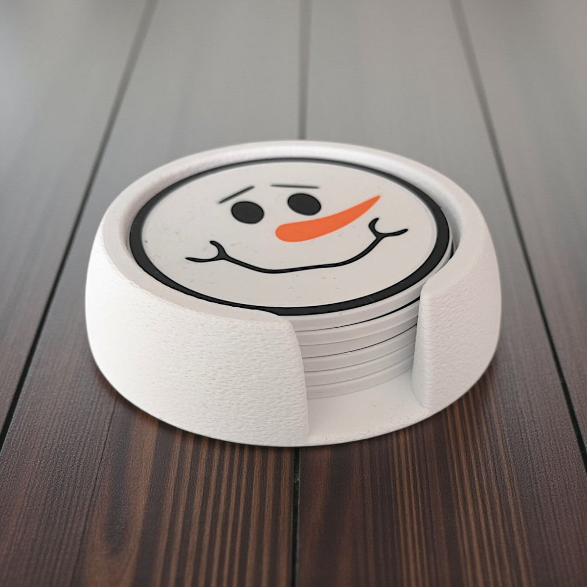 Six sous-verres bonshommes de neige aux visages différents dans leur support assorti