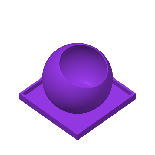 Gros plan du support de télécommande The Ball, de forme ronde avec cavité