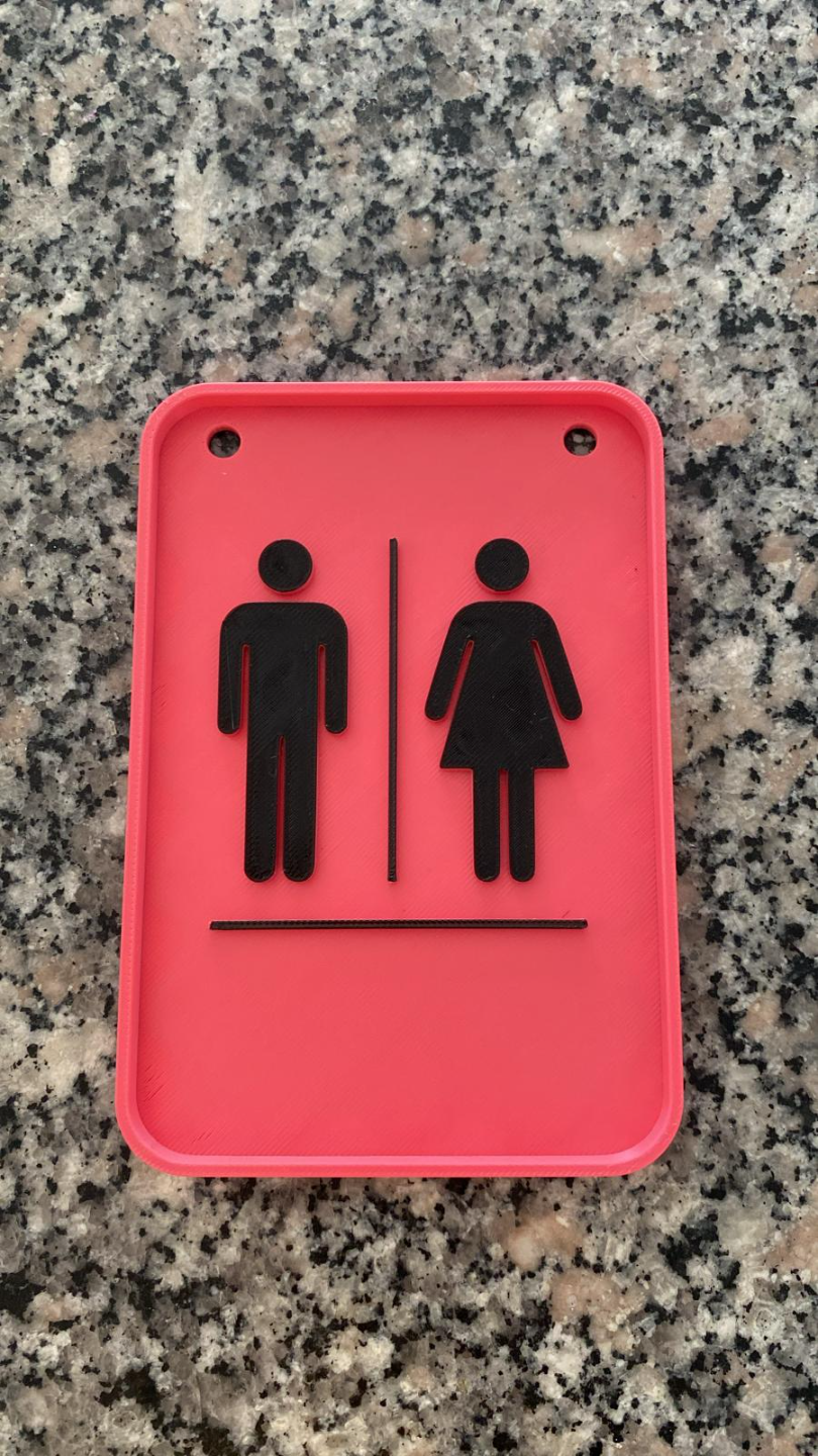 Plaque de porte WC minimaliste aux lettres simples, gros plan