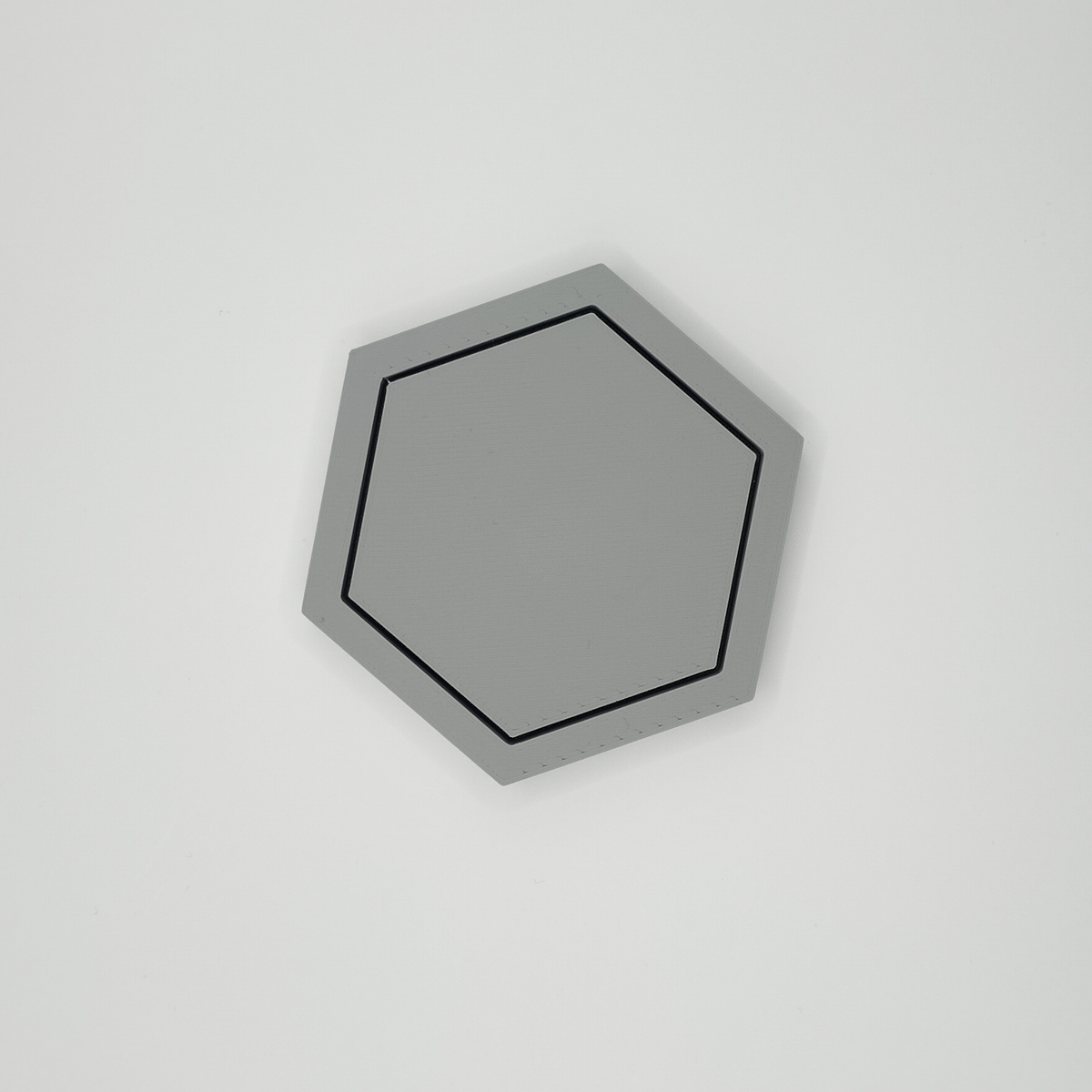 Gros plan du bord du sous-verre hexagonal à la géométrie nette