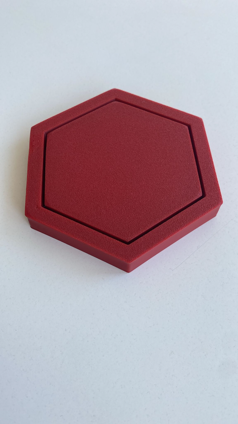 Sous-verre hexagonal vu de dessus, forme géométrique et surface plane