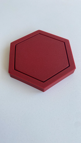 Sous-verre hexagonal vu de dessus, forme géométrique et surface plane