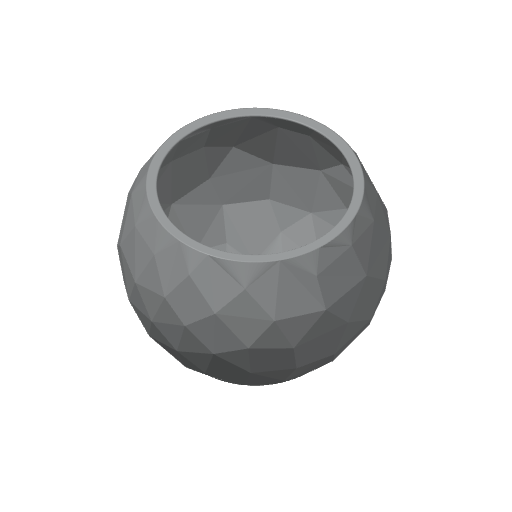 Gros plan d'une coupe low poly aux facettes inspirées de la pierre fissurée, avec jeu d'ombres