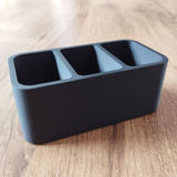 Range-télécommandes minimaliste aux lignes épurées et au design ouvert