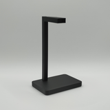 Support de casque minimaliste avec casque gaming sur un bureau moderne
