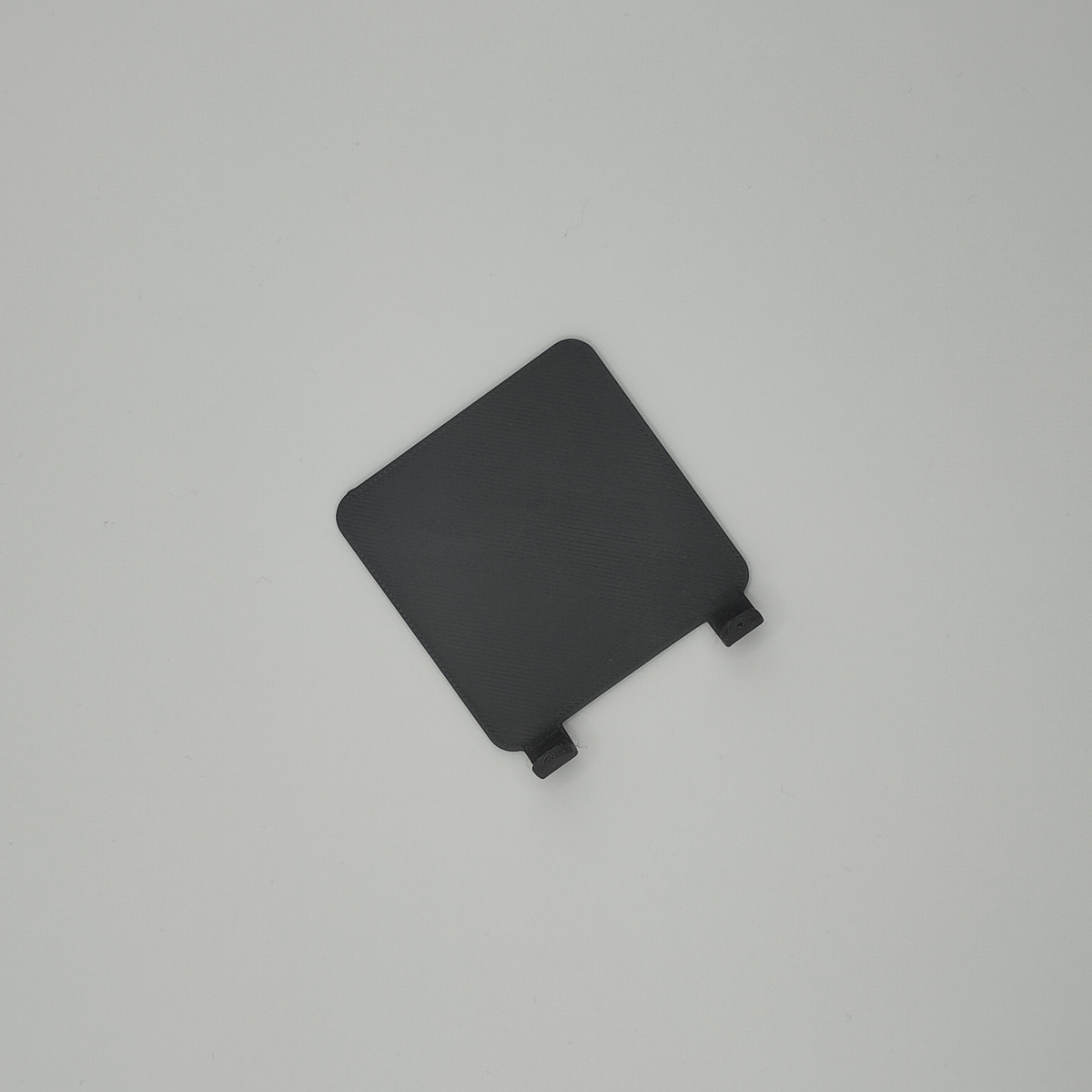 Détail du bord fin et de la surface discrète du support de grattoir