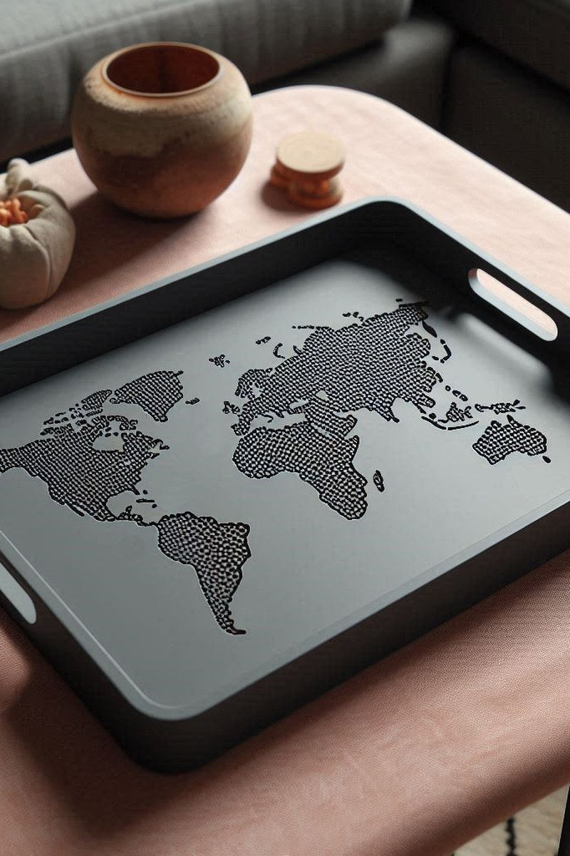 Plateau design OneWorld avec les continents en relief de la carte du monde, finition gris clair