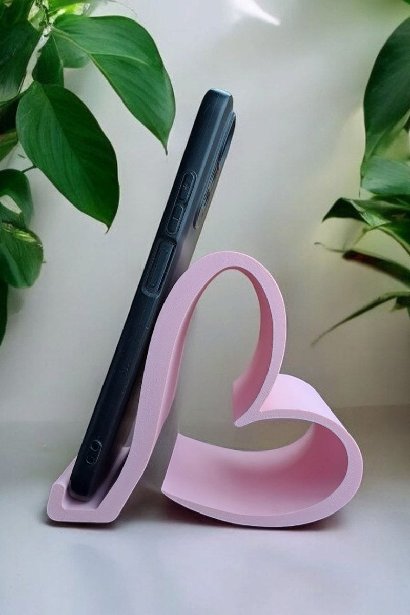 Gros plan du support de téléphone Valentine en forme de cœur, rose