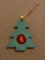 Étiquette cadeau en forme de sapin de Noël avec place pour une boule en chocolat
