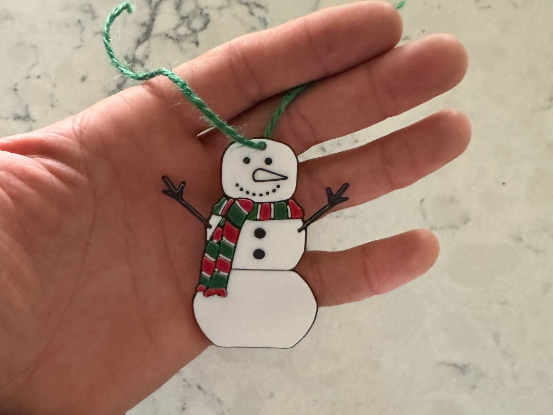 Étiquette cadeau en forme de bonhomme de neige