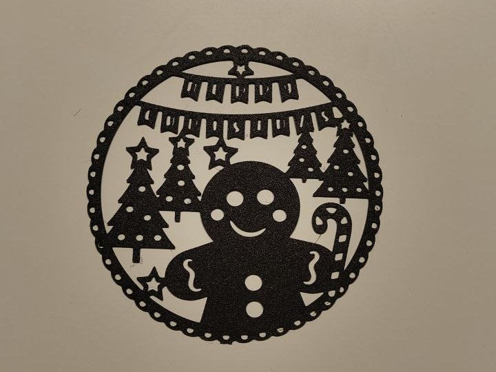 Silhouette de bonhomme en pain d'épices en décoration murale de Noël
