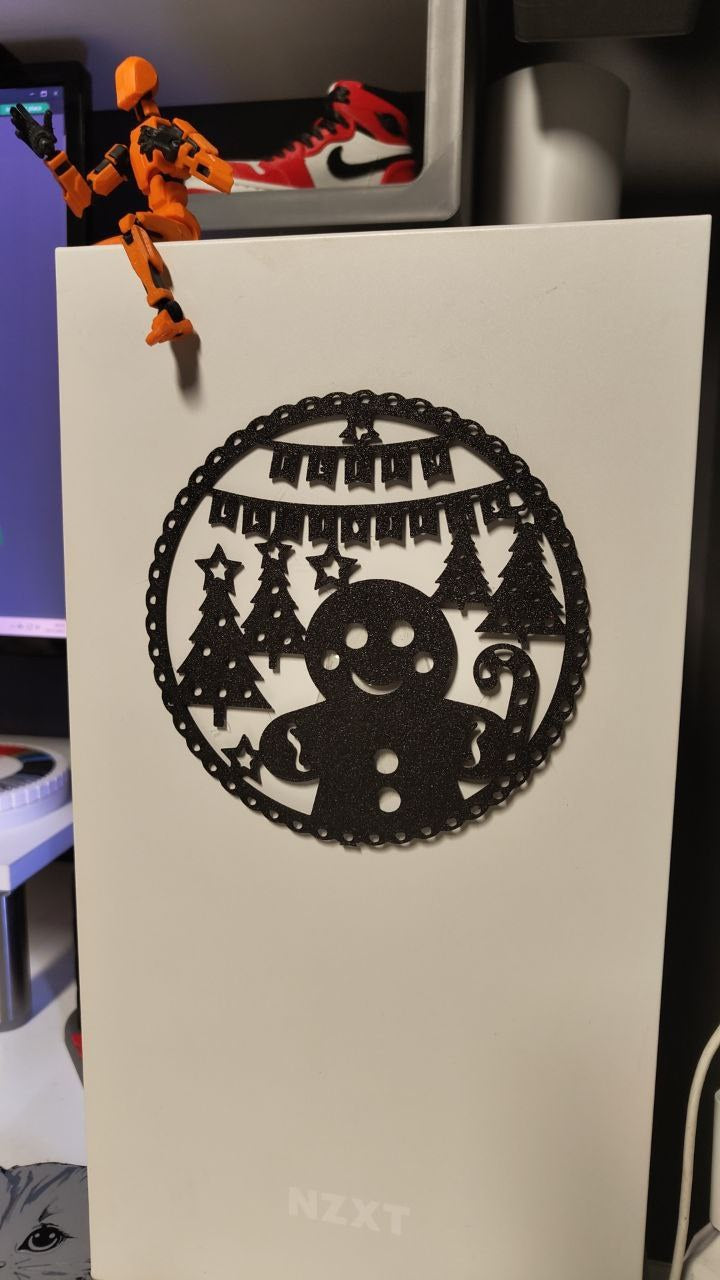 Silhouette de bonhomme en pain d'épices en décoration murale de Noël