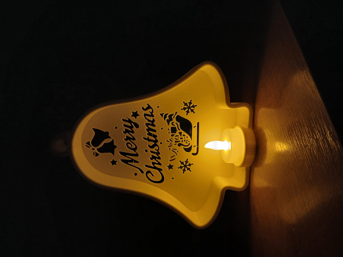 Cloche de Noël ajourée avec bougie LED