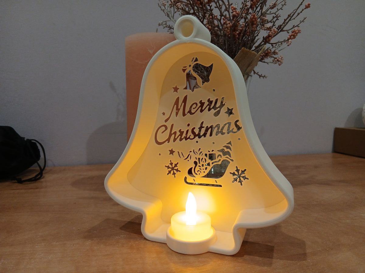 Cloche de Noël ajourée avec bougie LED