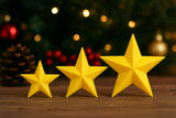 Trois étoiles de Noël de 3, 4 et 5 cm