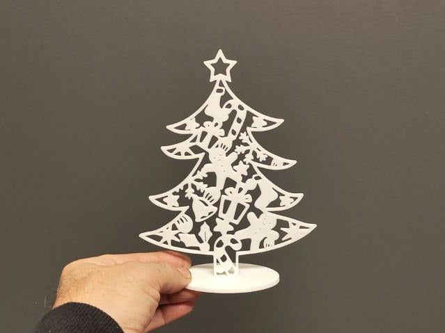 Petit sapin de Noël à poser avec des boules de Noël
