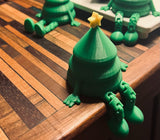 Petite figurine de sapin vert avec étoile jaune