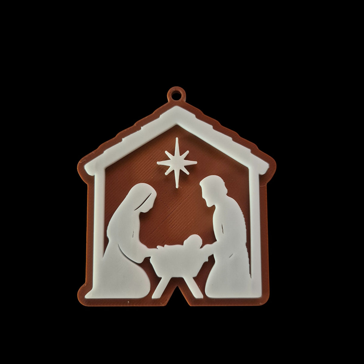 Décoration de sapin avec crèche : Marie, Joseph et l'Enfant Jésus