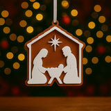 Décoration de sapin avec crèche : Marie, Joseph et l'Enfant Jésus