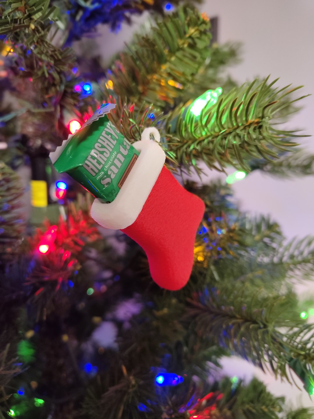 Petite chaussette de Noël en décoration de sapin