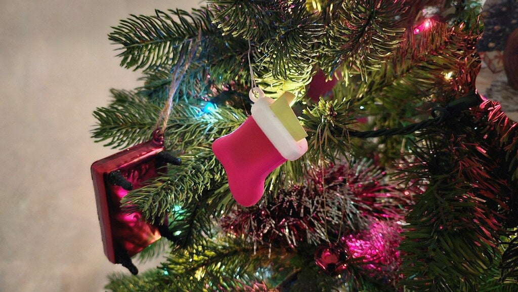 Petite chaussette de Noël en décoration de sapin