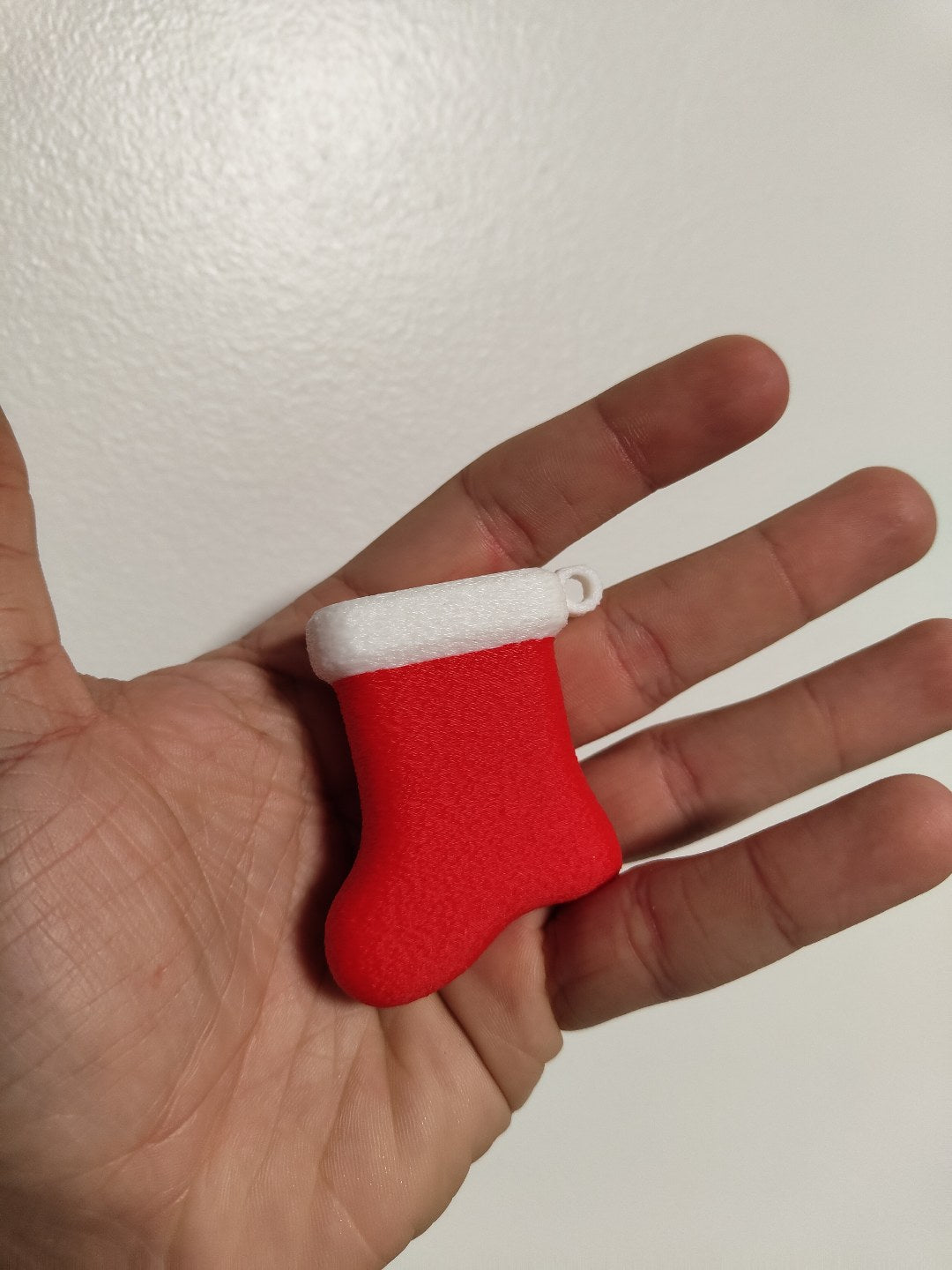 Petite chaussette de Noël en décoration de sapin
