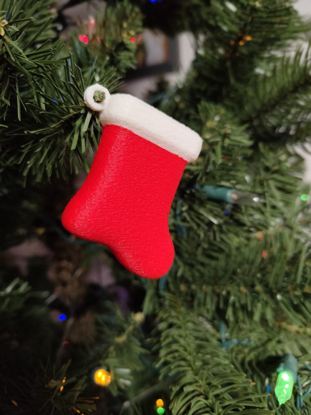 Petite chaussette de Noël en décoration de sapin