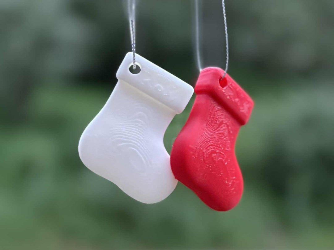Petite chaussette de Noël en décoration de sapin avec attache