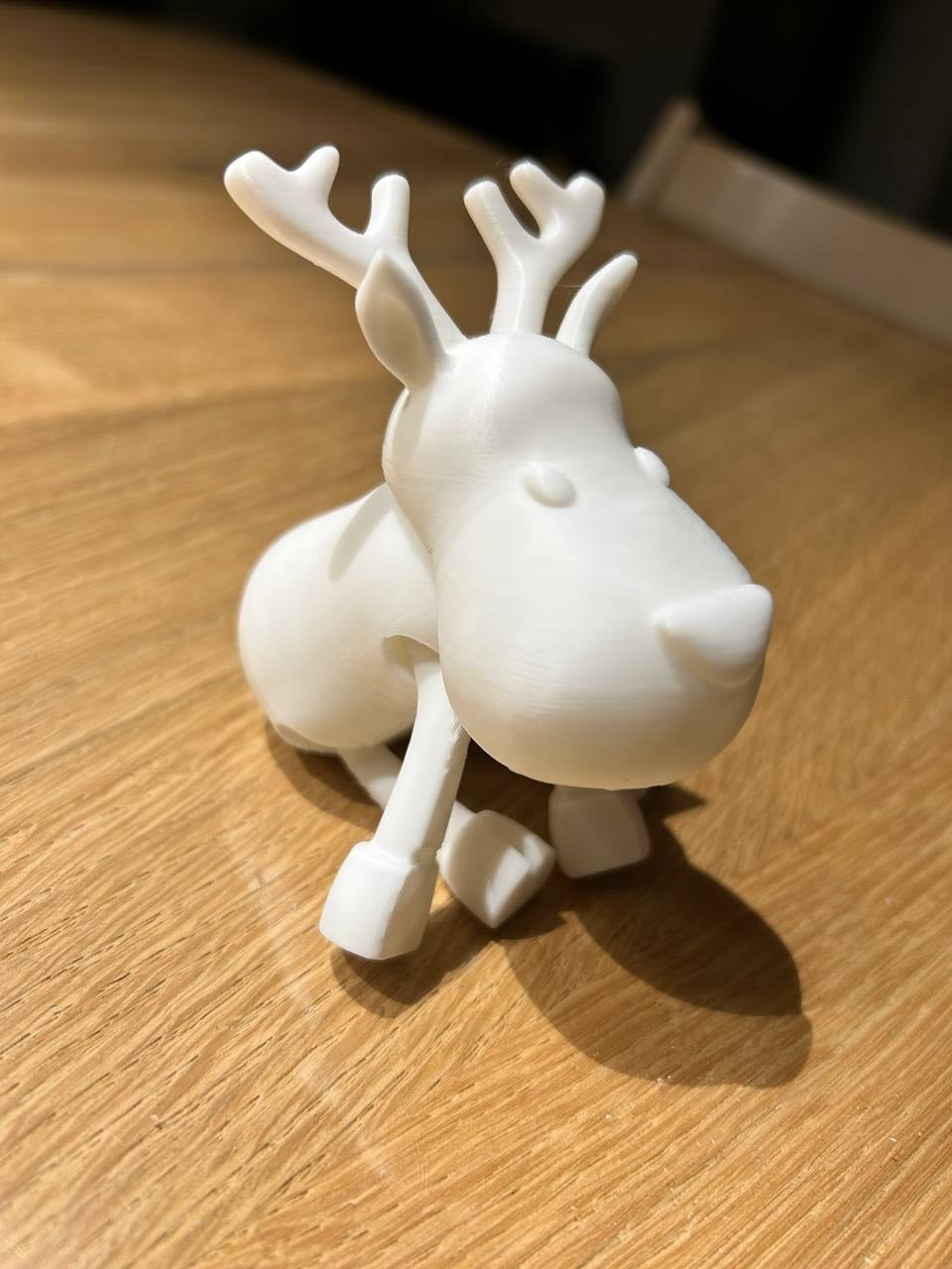 Adorable renne articulé bicolore