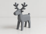 Figurine de renne minimaliste aux lignes épurées