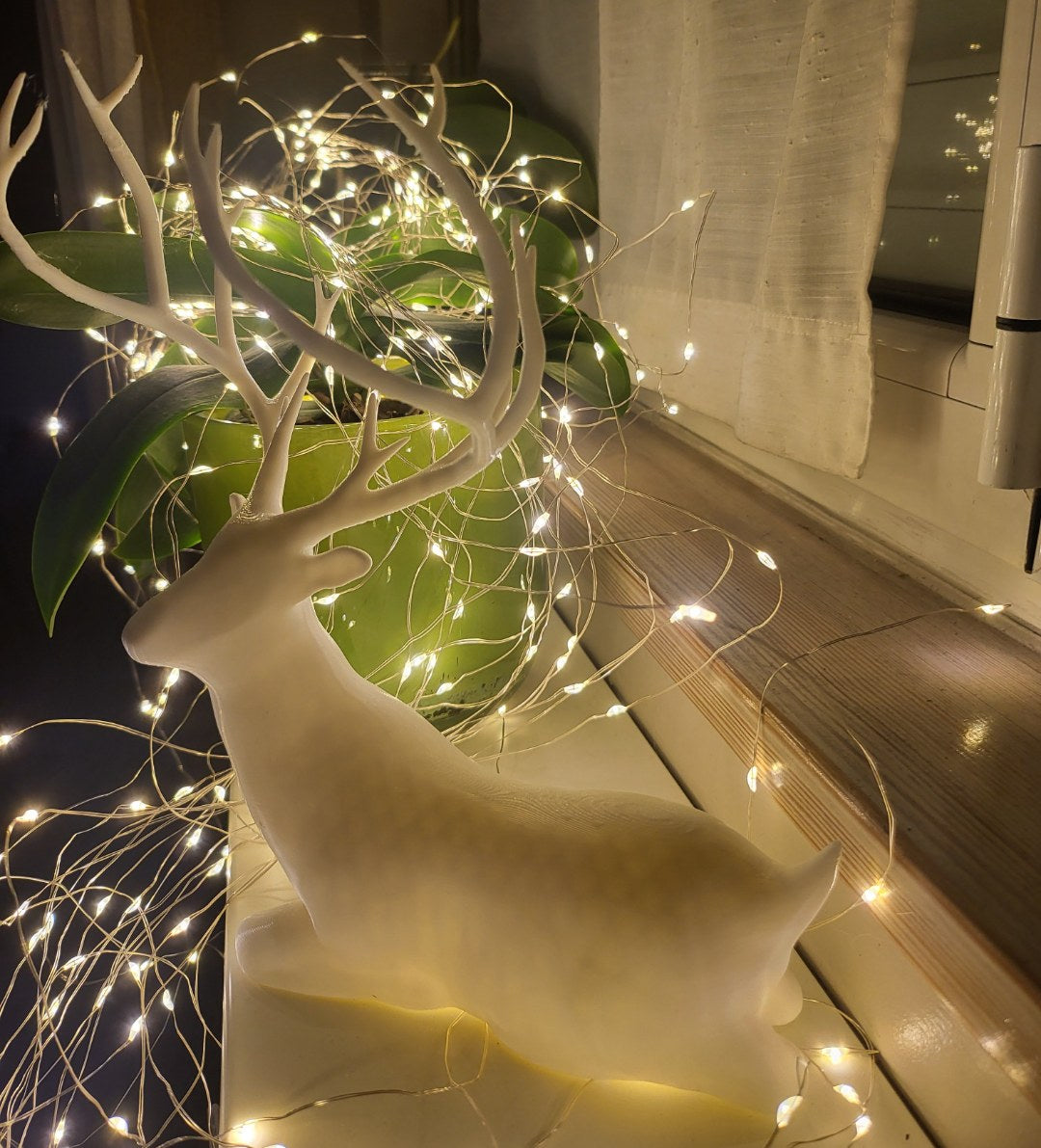 Figurine de renne assis – décoration de Noël