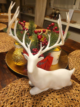 Figurine de renne assis – décoration de Noël