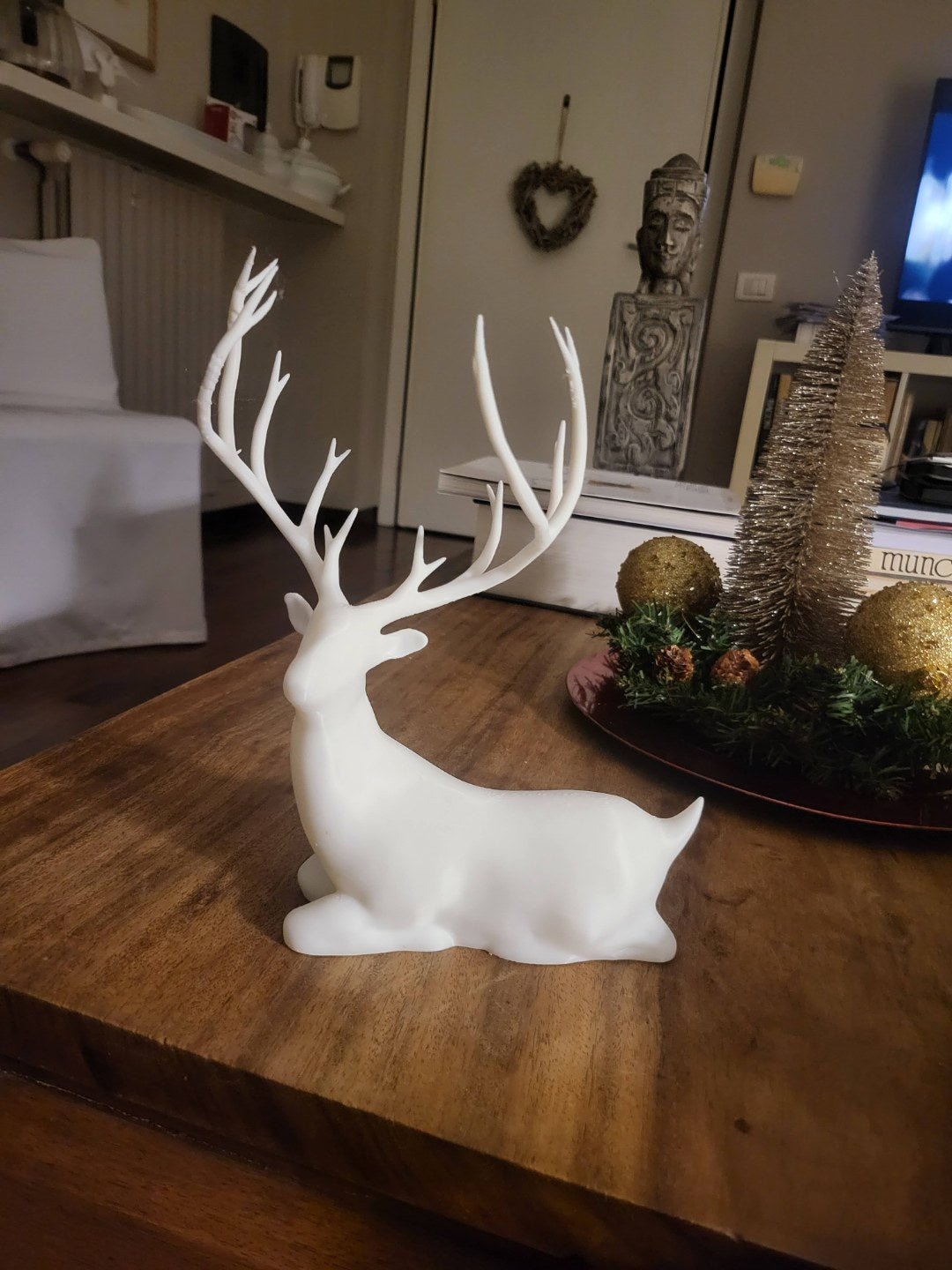 Figurine de renne assis – décoration de Noël