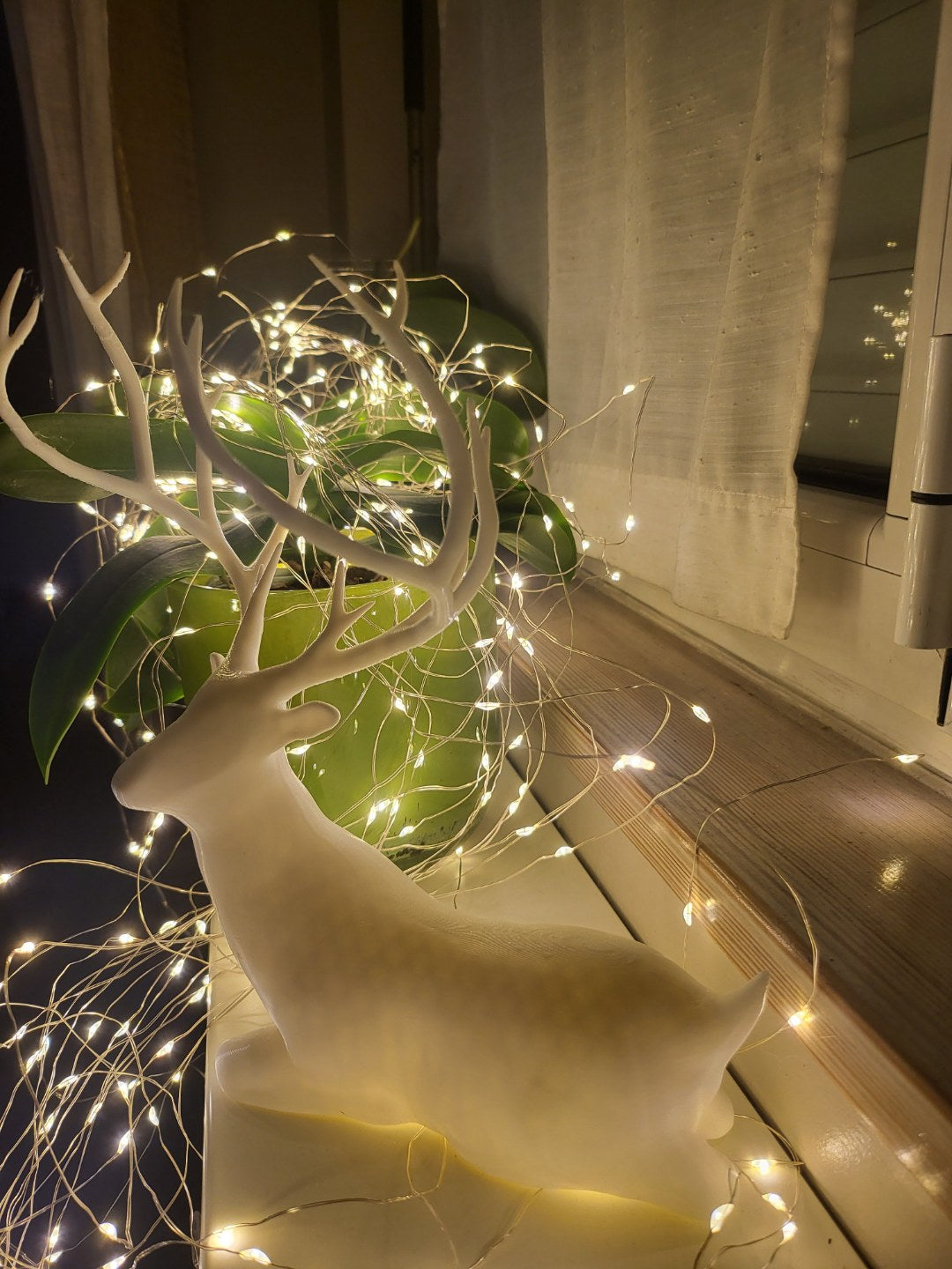 Figurine de renne assis – décoration de Noël
